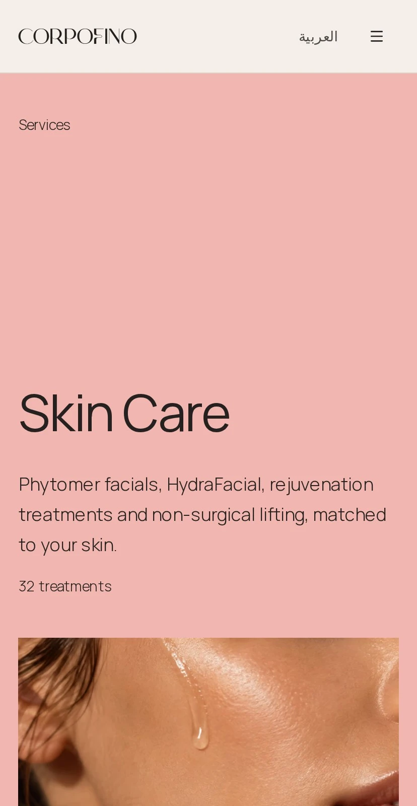 The Skin Care department page on a phone: the title “Skin Care”, a short description and the treatment count on a full blush field, above a close-up of a cheekbone with a single drop of serum.