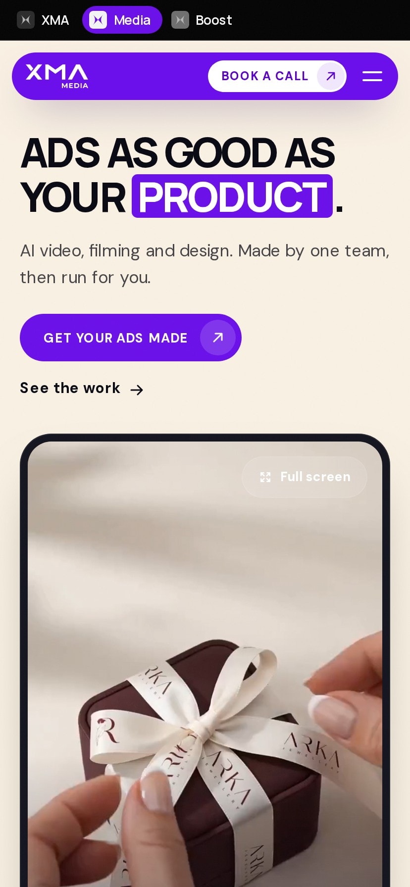 XMA Media homepage on a phone: the headline, a Get your ads made button and the first ad film